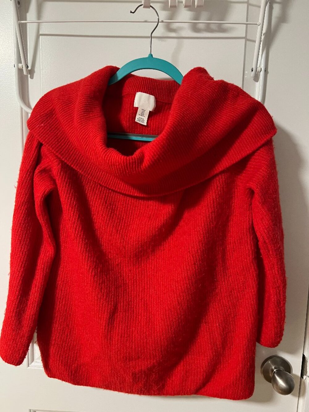 Red H&M off-the-shoulder cowl neck sweater